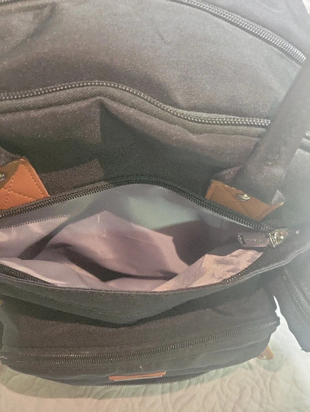 Black Quilted Backpack with Tan Accents